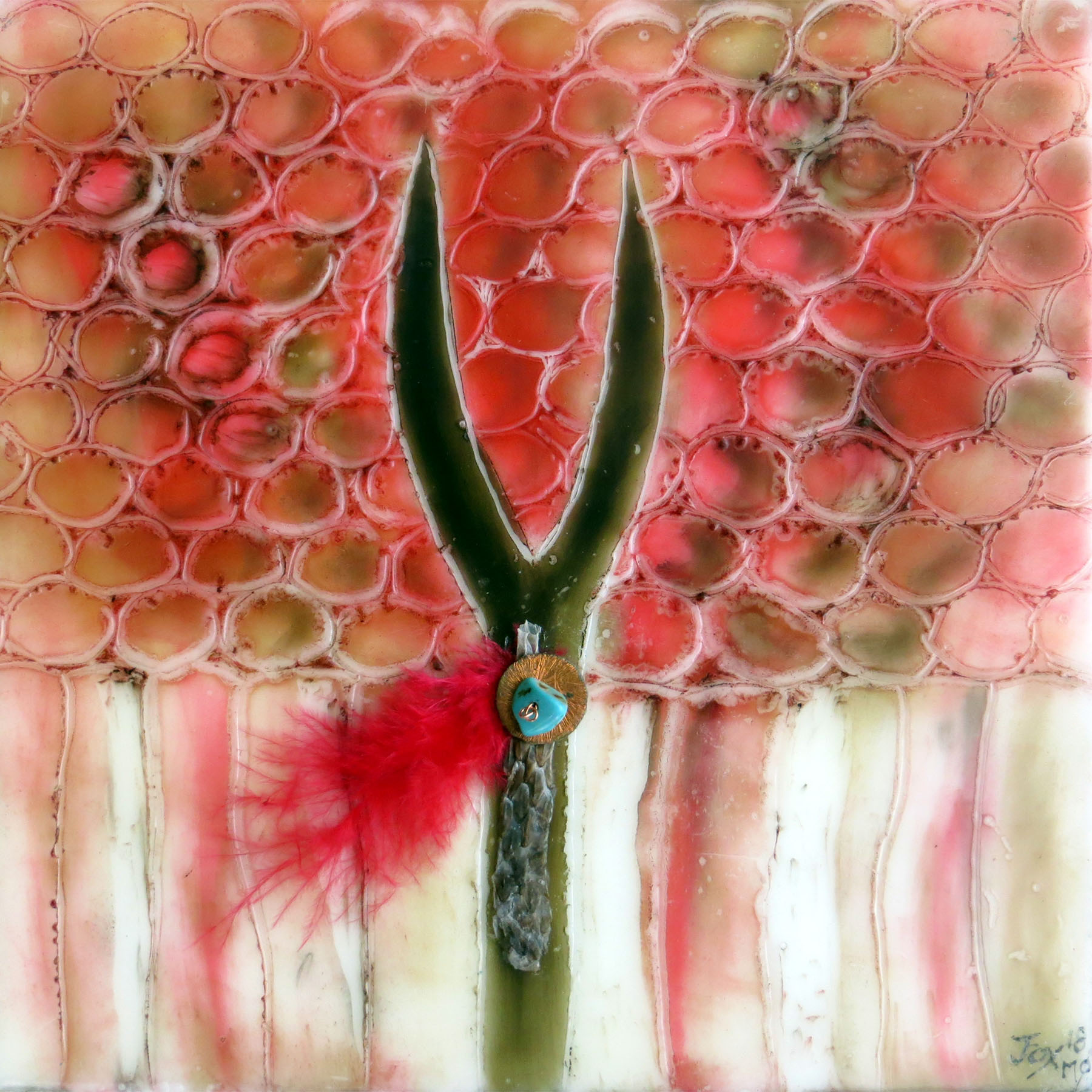 Image of an encaustic painting by Janet Fox including shedded snake skin, red feather, copper bead and turquoise bead.